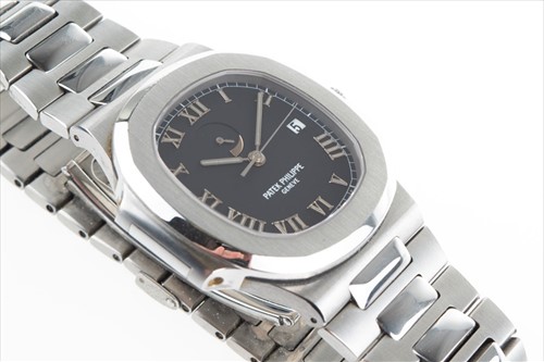 Lot 311 - A fine and rare Patek Philippe Nautilus Ref....