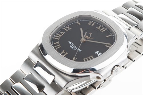 Lot 311 - A fine and rare Patek Philippe Nautilus Ref....
