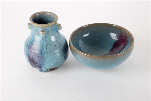 Lot 140 - A Jun ware purple splash stoneware tea bowl...