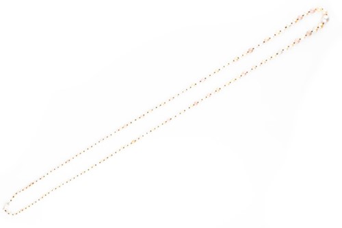 Lot 433 - An opera length natural pearl necklace...