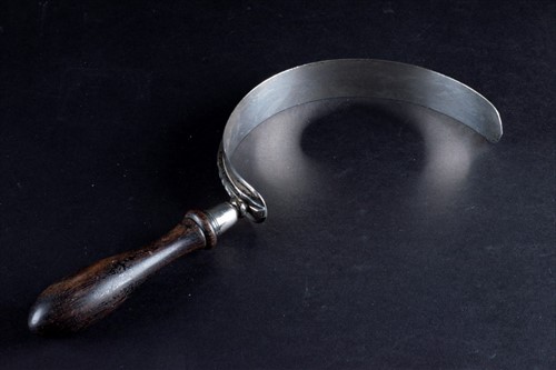 Lot 335 - An Edwardian Scottish silver table crumb scoop...