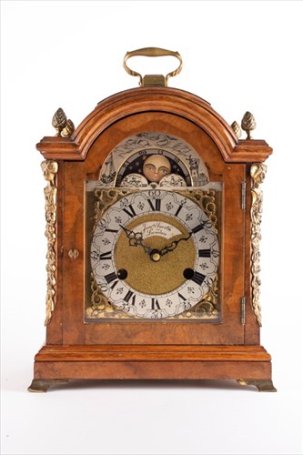Lot 303 - A German burr walnut moonphase mantle clockÂ ...