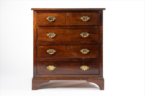 Lot 100 - A George III mahogany chest of drawers of...