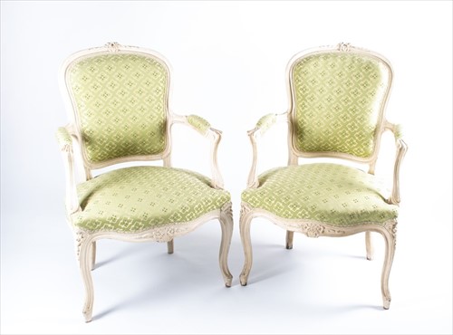 Lot 101 - A pair of Louis XV style bergere armchairs...