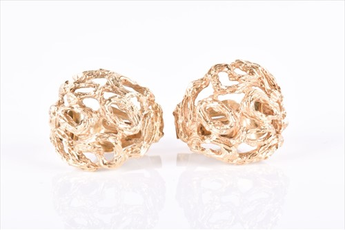 Lot 529 - A pair of yellow metal openwork earrings of...