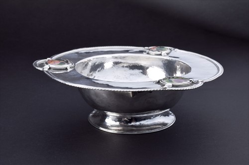 Lot 405 - A planished Arts and Crafts silver bowl with...