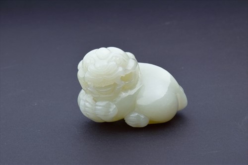 Lot 133 - A 19th century mutton jade figure of a...