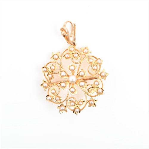 Lot 554 - An early 20th century yellow metal and seed...