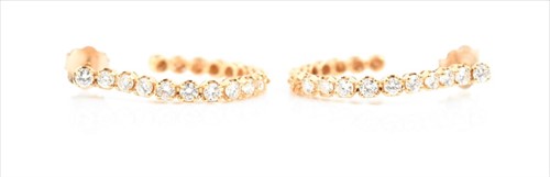 Lot 552 - A pair of yellow gold and diamond hoop...