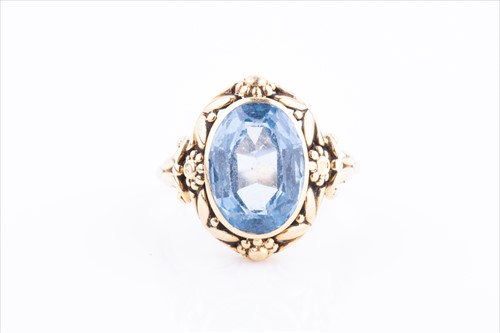 Lot 497A - A 9ct yellow gold and blue paste ring set with...
