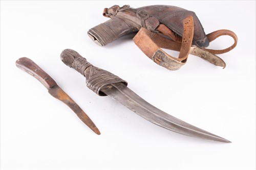 Lot 297 - A white metal and leather mounted Jambiya...