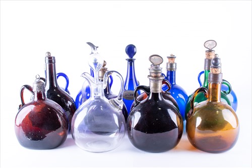 Lot 253 - A collection of thirteen coloured glass...