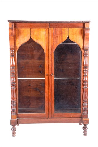 Lot 514 - A late 19th century mahogany two-door cabinet...