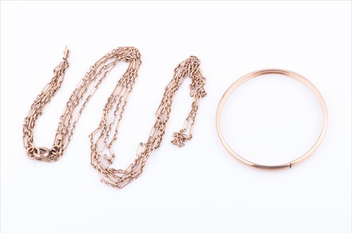 Lot 829 - A long fancy-link necklace or muff chain with...