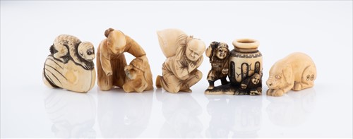 Lot 158 - A Japanese ivory netsuke in the form of a...