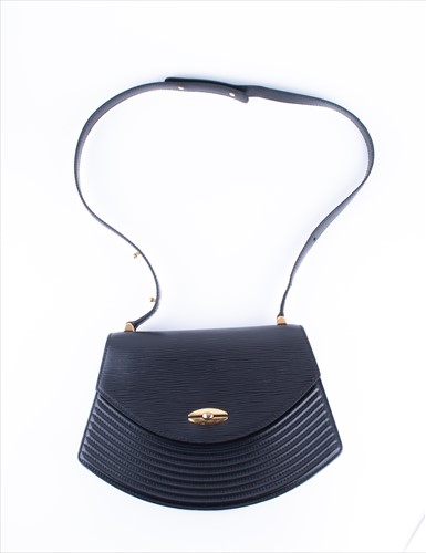 Lot 317 - A Louis Vuitton Tilsitt Pochette handbag in...