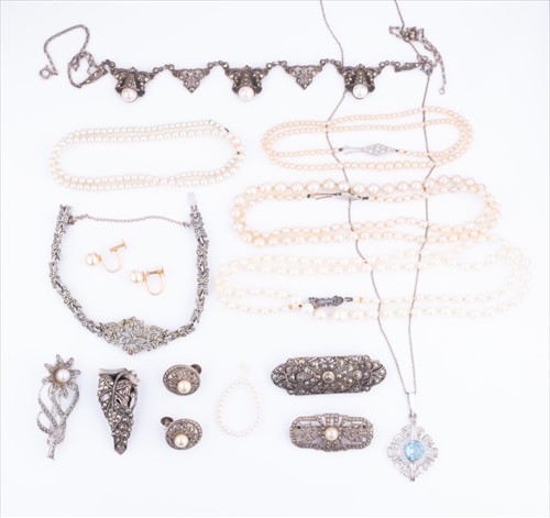 Lot 508 - A group of three pearl necklaces together with...