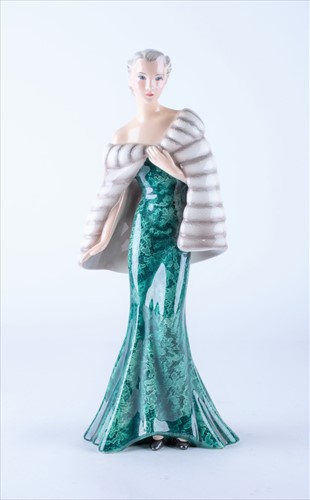 Lot 243 - An Art Deco Goldscheider figure of an elegant...