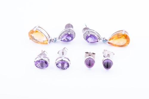 Lot 546 - A pair of cabochon amethyst stud earrings,...