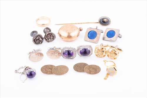 Lot 543 - A pair of 9ct yellow gold cufflinks together...
