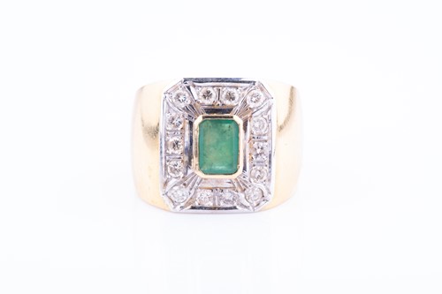 Lot 129 - A yellow metal, diamond and emerald ring,...
