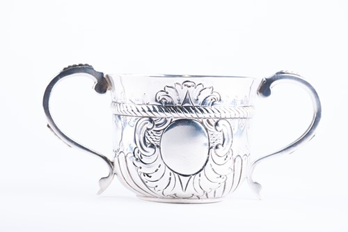 Lot 370 - A Georgian style silver porringer London 1906,...