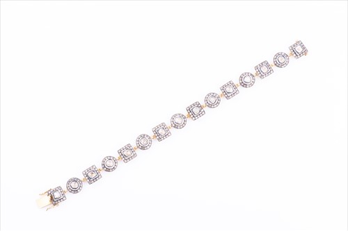 Lot 421 - An Indian diamond bracelet the alternating...