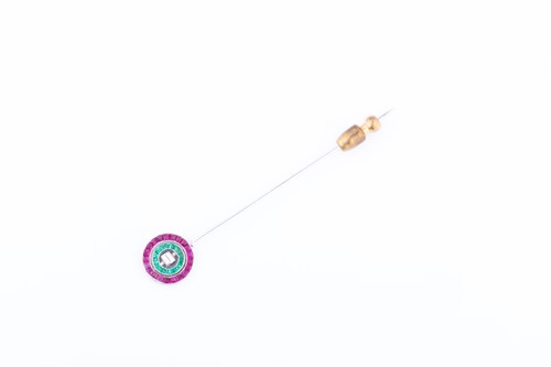 Lot 439 - A diamond, emerald, ruby, and sapphire stick...