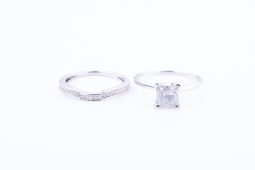 Lot 459 - A white metal and diamond ring set with a...