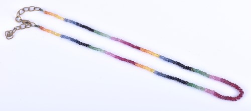 Lot 410 - A multi-coloured gemstone necklace, formed of...
