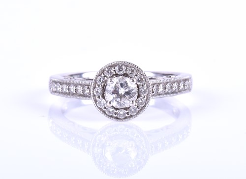 Lot 423 - A white gold and diamond engagement ring,...