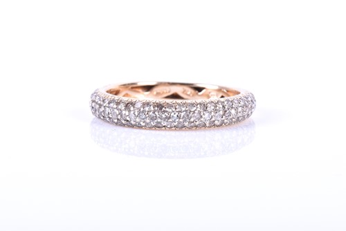 Lot 425 - A 14ct yellow gold and diamond half eternity...