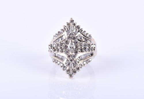 Lot 426 - A yellow metal and diamond cluster ring, the...