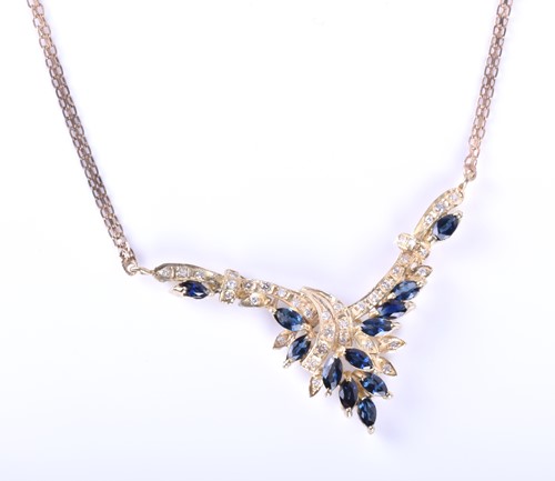 Lot 427 - A yellow metal, diamond and sapphire spray...