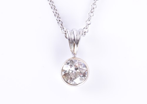 Lot 52 - An 18ct white gold and solitaire diamond...