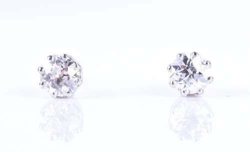 Lot 114 - A pair of old round-cut solitaire diamond stud...