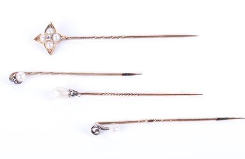 Lot 16 - A yellow metal, pearl, and diamond stick pin...