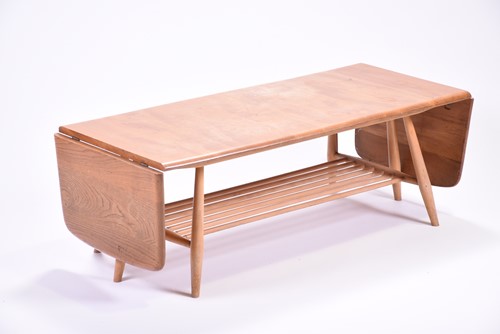 Lot 520 - An Ercol extendable coffee table, with a pair...