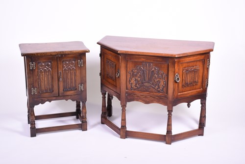 Lot 516 - An Old Charm oak side cabinet, the front...