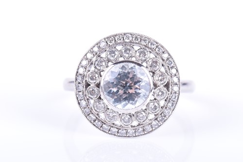 Lot 162 - An 18ct white gold, diamond, and aquamarine...