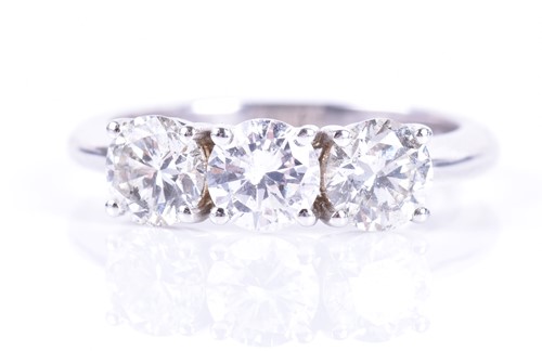 Lot 111 - An 18ct white gold and diamond ring set with...