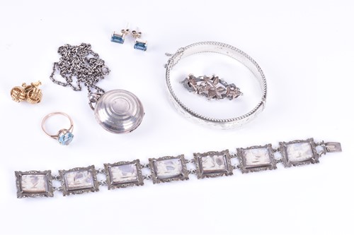 Lot 179 - A silver bangle with engraved decoration...