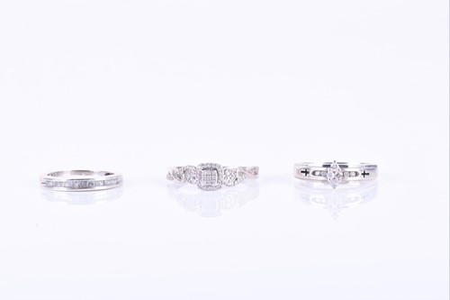 Lot 272 - A silver and diamond accent cluster ring size...