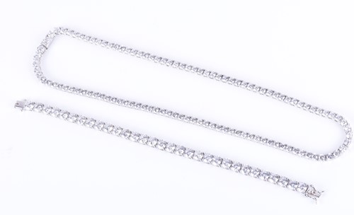 Lot 273 - A silver and cubic zirconia line necklace set...