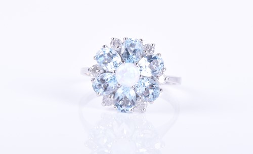 Lot 280 - A 9ct white gold, aquamarine, opal, and...