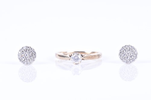 Lot 285 - A 9ct yellow gold and solitaire diamond ring...