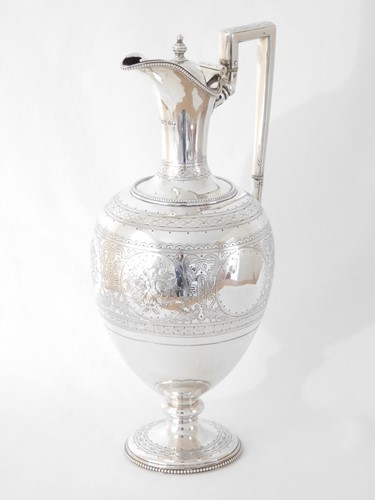 Lot 453 - A Victorian silver lidded ewer, Martin, Hall &...