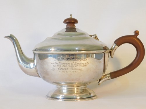 Lot 451 - A late George V silver teapot, Joseph Gloster...
