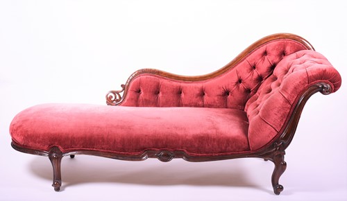 Lot 160 - A Victorian walnut framed chaise longue with...