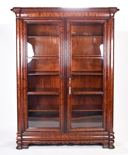 Lot 131 - A large 19th century flame mahogany bookcase,...